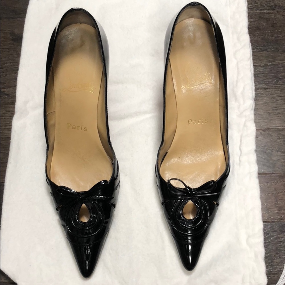 Black patent leather heels.
